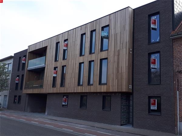 Gelijkvloers nieuwbouw appartement met 2 slaapkamers, terras en tuin