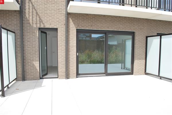 Modern gelijkvloers nieuwbouwappartement met groot zonneterras te huur in Sint-Niklaas