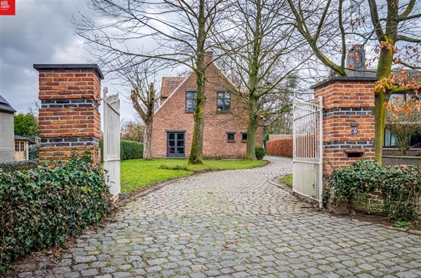 Prachtig gelegen open bebouwing met grote tuin te Sint Pauwels